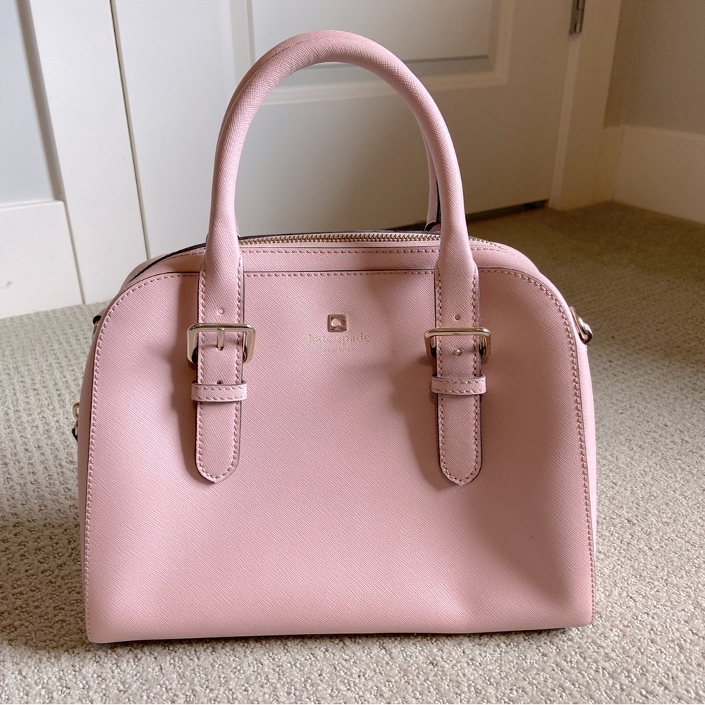 Kate Spade pink Satchel bag with pink daisy attachment.  Like new.